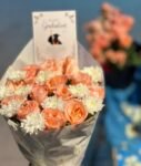 send-graduation-bouquet-light-orange-roses-online