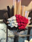 elegant-red-roses-white-carnations-two-tone-wrapped-bouquet