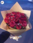 romantic-red-roses-bouquet-medium-size-yellow-wrapping-faisalabad