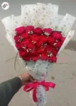 romantic-red-roses-babys-breath-bouquet-white-printed-wrapping-faisalabad