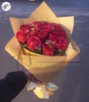 romantic-red-roses-bouquet-medium-size-yellow-wrapping-faisalabad