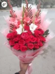 red-roses-white-pink-gladiolus-bouquet-pink-wrapping-faisalabad