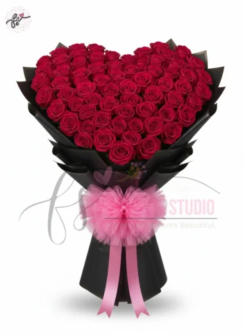 Heart-shaped red roses bouquet, perfect for romantic gestures, anniversaries, and special celebrations in Faisalabad.
