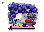 Purple Balloons Birthday Cake Basket with Red Flowers and Chocolates