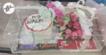 birthday-gift-acrylic-box-with-cake-and-flower-arrangement