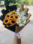 status-bouquet-sunflowers-white-gladiolus-black-yellow-wrapping-faisalabad