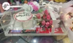 birthday-gift-acrylic-box-with-cake-and-flower-arrangement