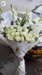 fresh-white-rose-bouquet-white-paper-wrapping